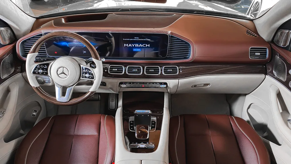 Mercedes-Maybach S-Class interior with branded steering wheel and two-tone leather cabin — Maybach chauffeur London